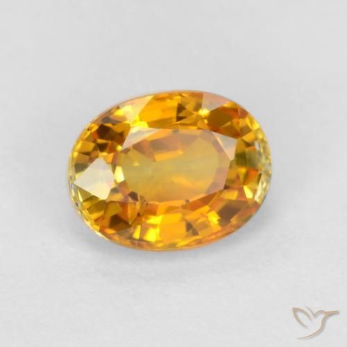 Zaffiro Arancio Scuro-Oro naturale da 0.72 ct, Ovale, VS