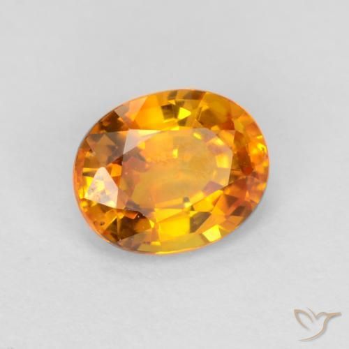 Zaffiro Arancio Scuro-Oro naturale da 0.72 ct, Ovale, VVS-VS