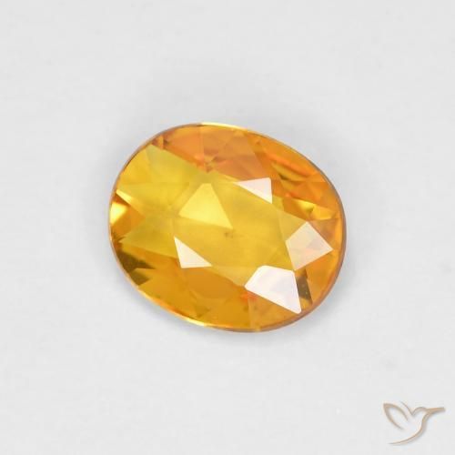 Zaffiro Arancio Scuro-Oro naturale da 0.58 ct, Ovale, VVS-VS