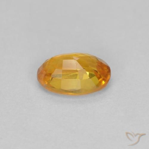 Zaffiro Arancio intenso-OroG naturale da 0.56 ct, Ovale, VVS-VS
