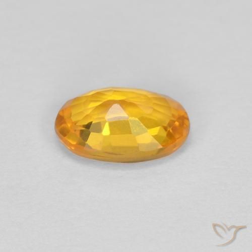 Zaffiro Arancio Scuro-Oro naturale da 0.62 ct, Ovale, VVS