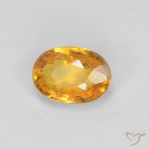 Zaffiro Arancio intenso-OroG naturale da 0.65 ct, Ovale, VVS