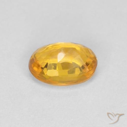 Zaffiro Arancio intenso-OroG naturale da 0.65 ct, Ovale, VVS
