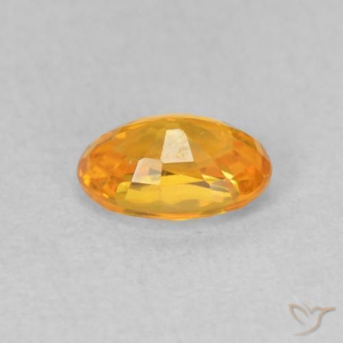 Zaffiro Arancio Scuro-Oro naturale da 0.62 ct, Ovale, VVS-VS