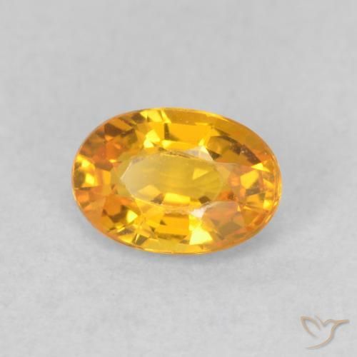 Zaffiro Arancio intenso-OroG naturale da 0.68 ct, Ovale, VVS-VS