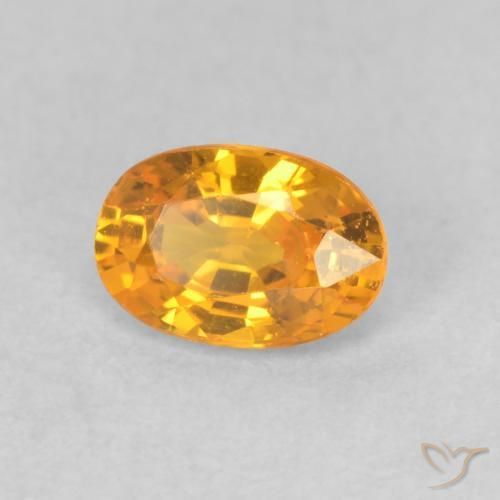 Zaffiro Arancio intenso-OroG naturale da 0.66 ct, Ovale, VVS-VS