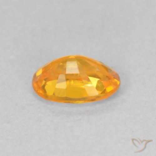 Zaffiro Arancio intenso-OroG naturale da 0.66 ct, Ovale, VVS-VS