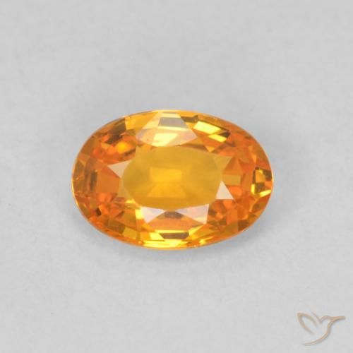 0.60ct Naturale Albicocca Arancia Zaffiro, Ovale, VVS