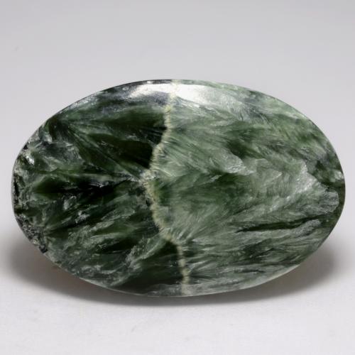 Serafinito Verde scuro naturale da 21.21 ct, Taglio ovale, Opaco