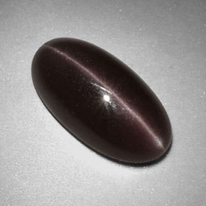 Sillimanite cat's eye naturale marrone da 7,07 ct, taglio ovale, opaco