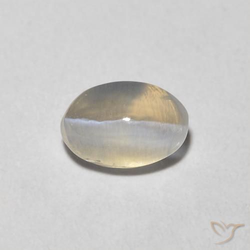 0.81ct Naturale Bianco caldo Sillimanite effetto occhio di gatto, Ovale, Trasparente