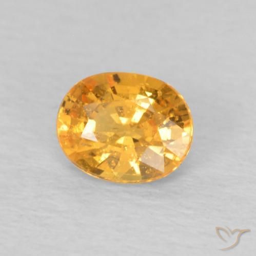 Granato spessartite Medium Light-Orange naturale da 0.49 ct, Ovale, VS