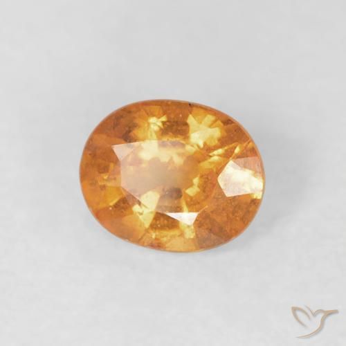 Granato spessartite Arancione brillante naturale da 0.49 ct, Ovale, VS-SI