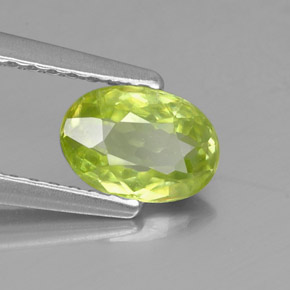 Sfene Verde dorato naturale da 0.64 ct, Taglio ovale, VS