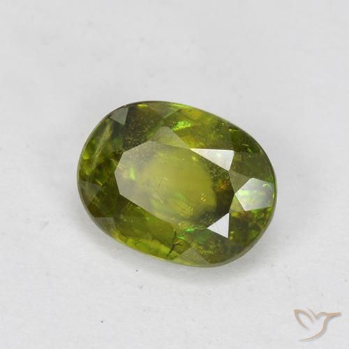 Sfene Caldo terroso verde naturale da 0.83 ct, Ovale, VS-SI