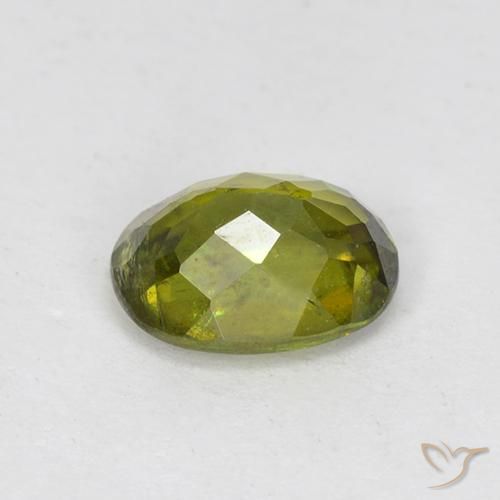 Sfene Caldo terroso verde naturale da 0.83 ct, Ovale, VS-SI