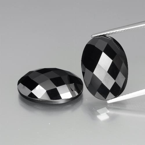 Spinello naturale nero da 24,58 ct, taglio ovale, opaco
