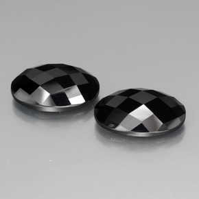 Spinello naturale nero da 24,58 ct, taglio ovale, opaco