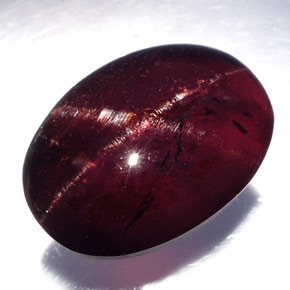 Granato stellato naturale nero da 19,80 ct, taglio ovale, opaco
