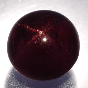 Granato stellato naturale nero da 10,82 ct, taglio rotondo, opaco
