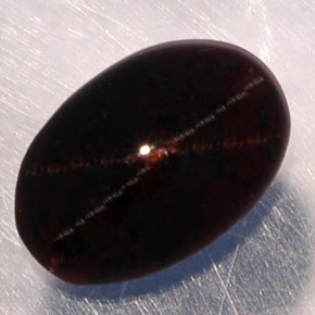 Granato stellato naturale nero da 3,87 ct, taglio ovale, traslucido