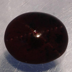 Granato stellato naturale nero rossastro da 5,02 ct, taglio ovale, traslucido