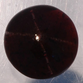 Granato stellato naturale nero da 4,36 ct, taglio rotondo, traslucido