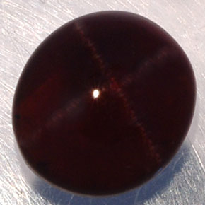 Granato stellato naturale nero da 3,81 ct, taglio ovale, traslucido