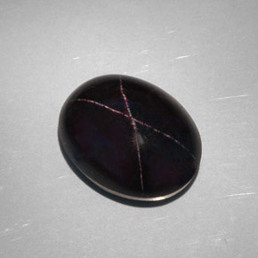 Granato stellato naturale nero da 28,81 ct, taglio ovale, opaco