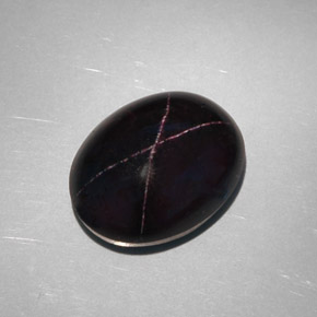 Granato stellato naturale nero da 28,81 ct, taglio ovale, opaco