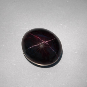 Granato stellato naturale nero da 32,55 ct, taglio ovale, opaco