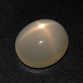 Pietra di luna stellata Arancione Crema naturale da 11.16 ct, Taglio ovale, Traslucido