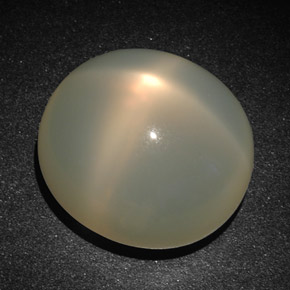 Pietra di luna stellata naturale crema da 22,83 ct, taglio ovale, traslucido