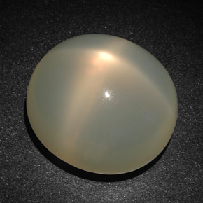 Pietra di luna stellata naturale crema da 22,83 ct, taglio ovale, traslucido