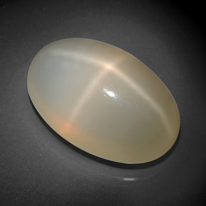 Pietra di luna stellata naturale crema da 33,90 ct, taglio ovale, traslucido