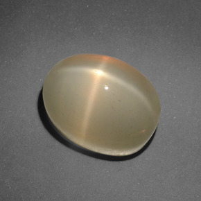 Pietra di luna stellata naturale arancione da 7,31 ct, taglio ovale, traslucido