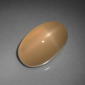 Pietra di luna stellata naturale arancione da 6,85 ct, taglio ovale, traslucido