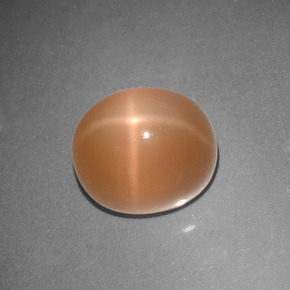 Pietra di luna stellata naturale arancione da 5,07 ct, taglio ovale, traslucido