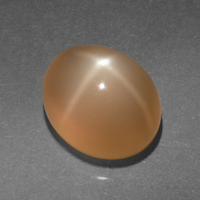 Pietra di luna stellata naturale arancione da 4,95 ct, taglio ovale, traslucido