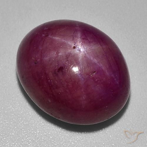 Rubino stellato Rosso scuro naturale da 24.47 ct, Taglio ovale, Opaco