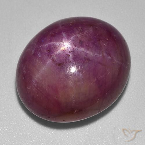 Rubino Stellato Rosso viola naturale da 23.39 ct, Ovale, Opaco