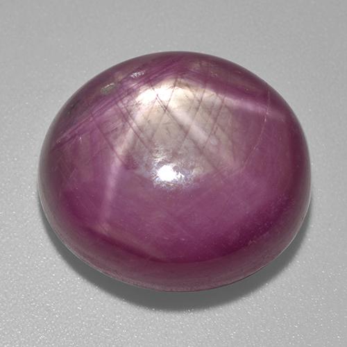 Rubino Stellato Viola rossastro naturale da 32.18 ct, Taglio ovale, Opaco