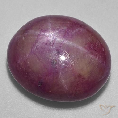 Rubino Stellato Magenta grigiastro naturale da 22.76 ct, Ovale, Opaco