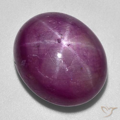 Rubino Stellato Viola scuro naturale da 25.25 ct, Ovale, Opaco