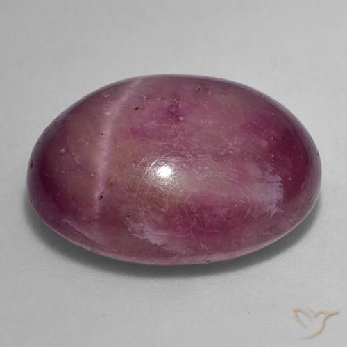 Rubino Stellato Magenta grigiastro naturale da 25.16 ct, Ovale, Opaco