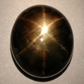 Zaffiro stellato naturale nero da 24,91 ct, taglio ovale, opaco