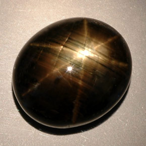 Zaffiro stellato naturale nero da 24,91 ct, taglio ovale, opaco