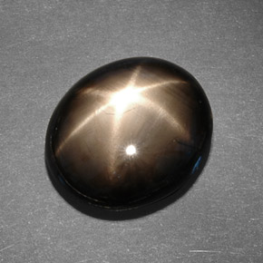 Zaffiro stellato naturale nero da 13,78 ct, taglio ovale, opaco