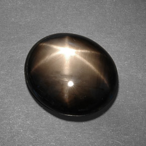 Zaffiro stellato naturale nero da 13,78 ct, taglio ovale, opaco