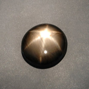 Zaffiro stellato naturale nero da 12,04 ct, taglio ovale, opaco
